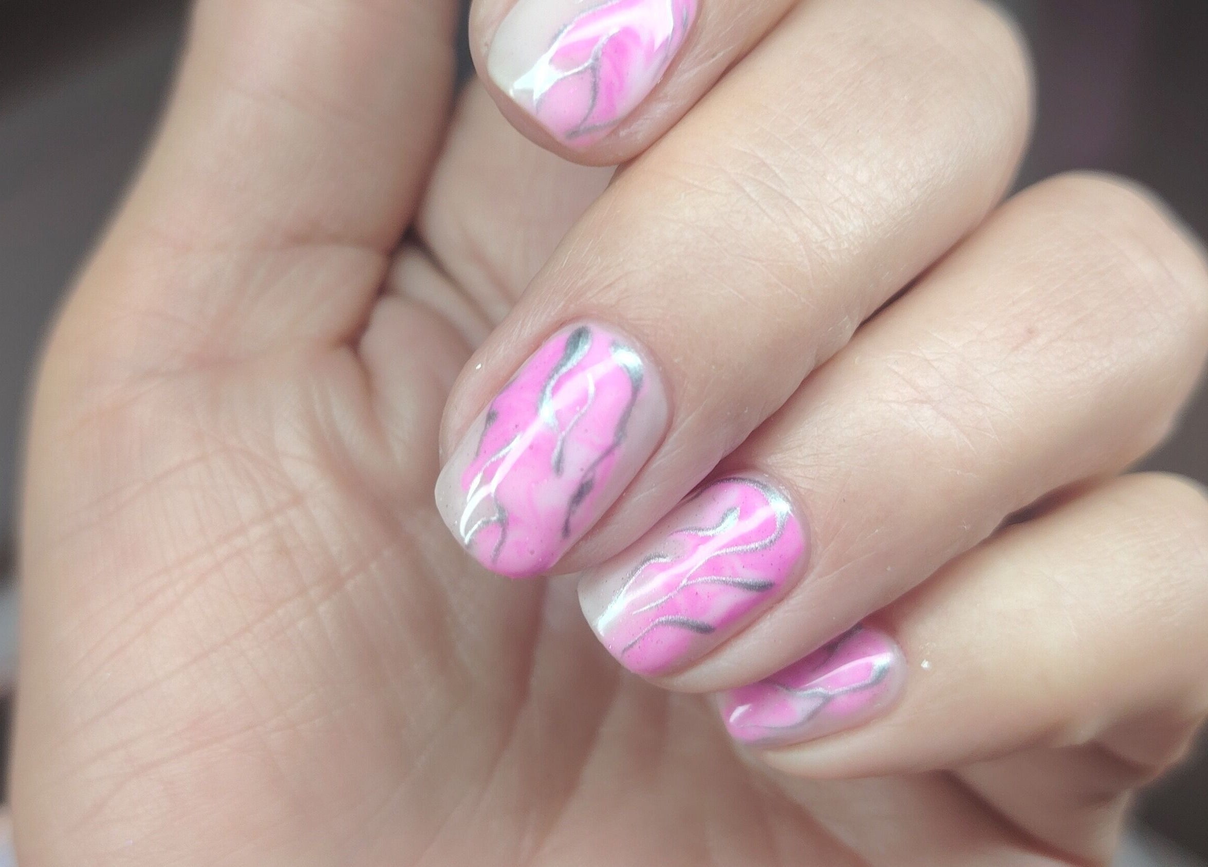 Pink and silver nail art at Studio 59 Pro Cosmetology, Microblading & Body Piercing in Rumney, Wales, GB.