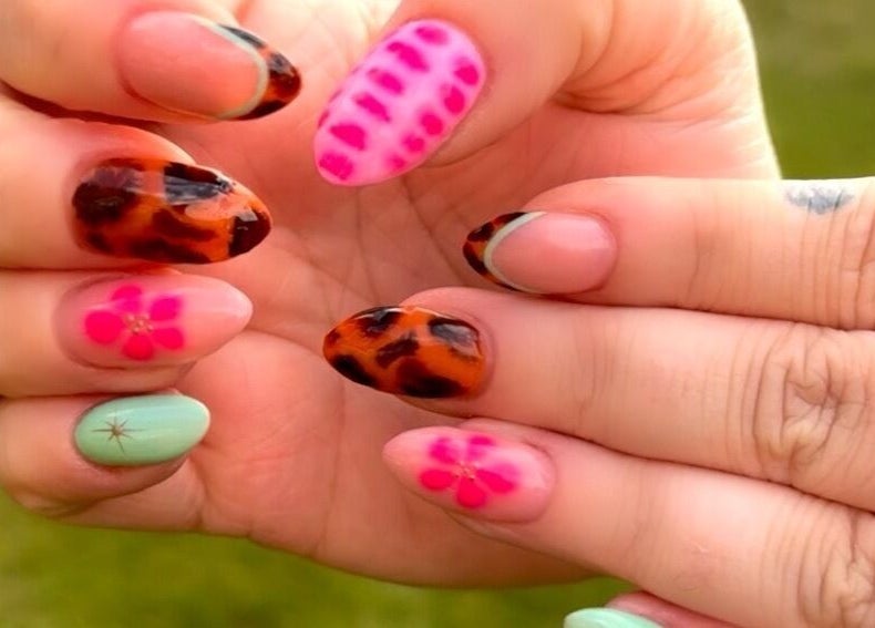 Stylish nail art with floral and animal designs at Abigail’s in Darlington, England, GB.