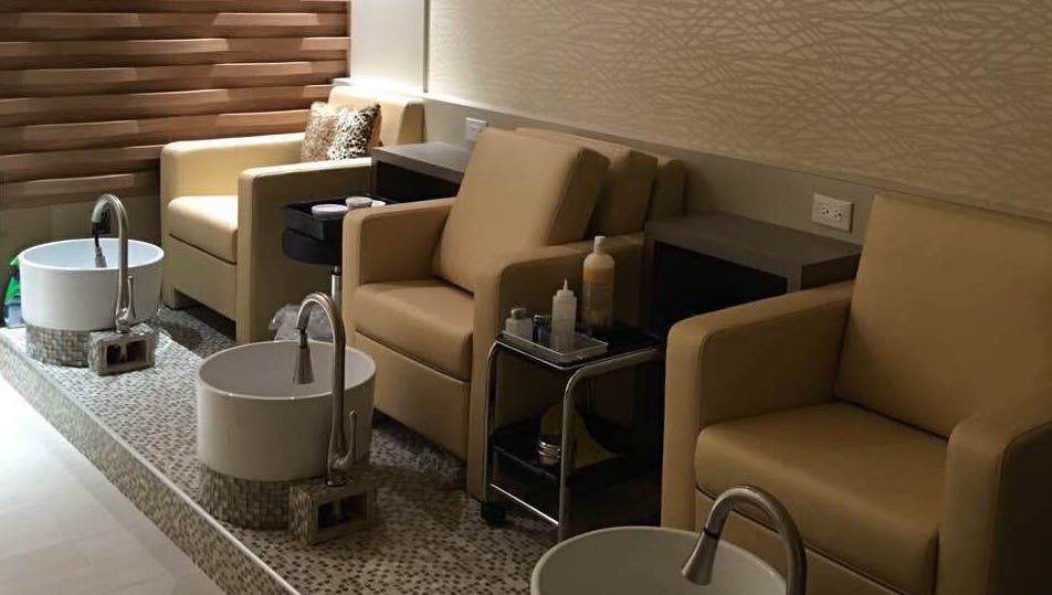 Pedicure chairs and basins at Essence Nails & Spa in Vaughan, Ontario, CA for relaxing spa experiences.