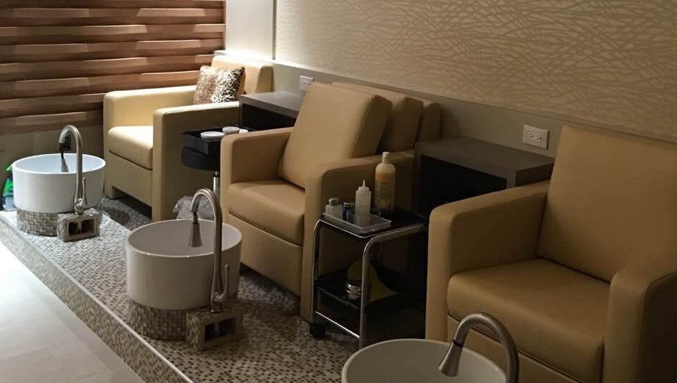 Pedicure chairs and basins at Essence Nails & Spa in Vaughan, Ontario, CA for relaxing spa experiences.