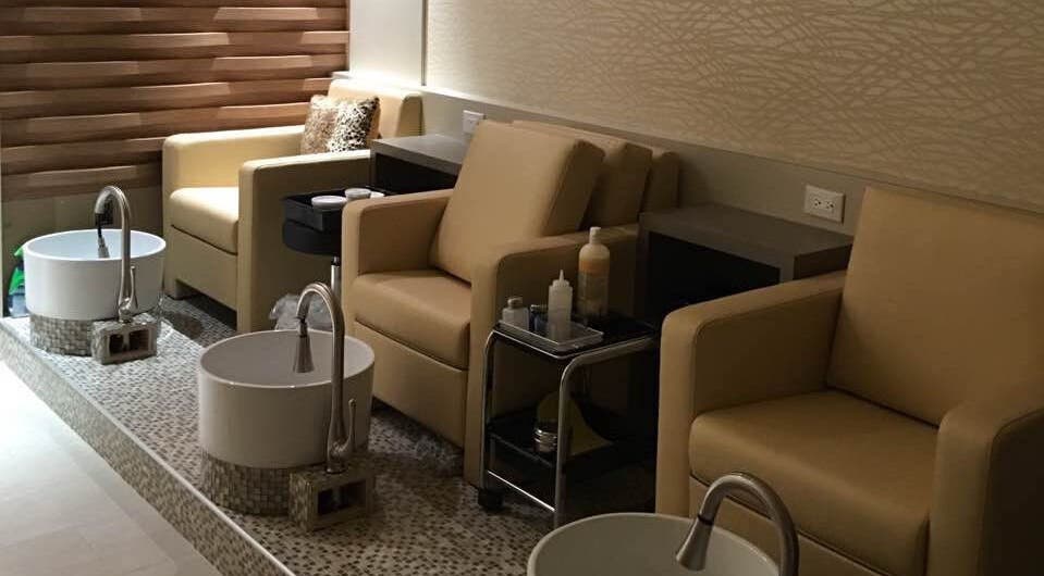 Pedicure chairs and basins at Essence Nails & Spa in Vaughan, Ontario, CA for relaxing spa experiences.