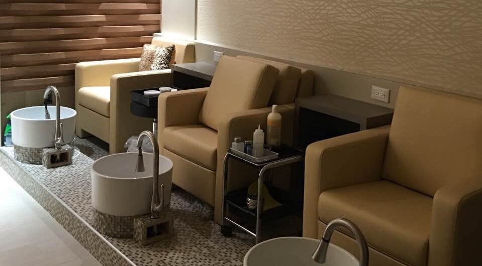 Pedicure chairs and basins at Essence Nails & Spa in Vaughan, Ontario, CA for relaxing spa experiences.