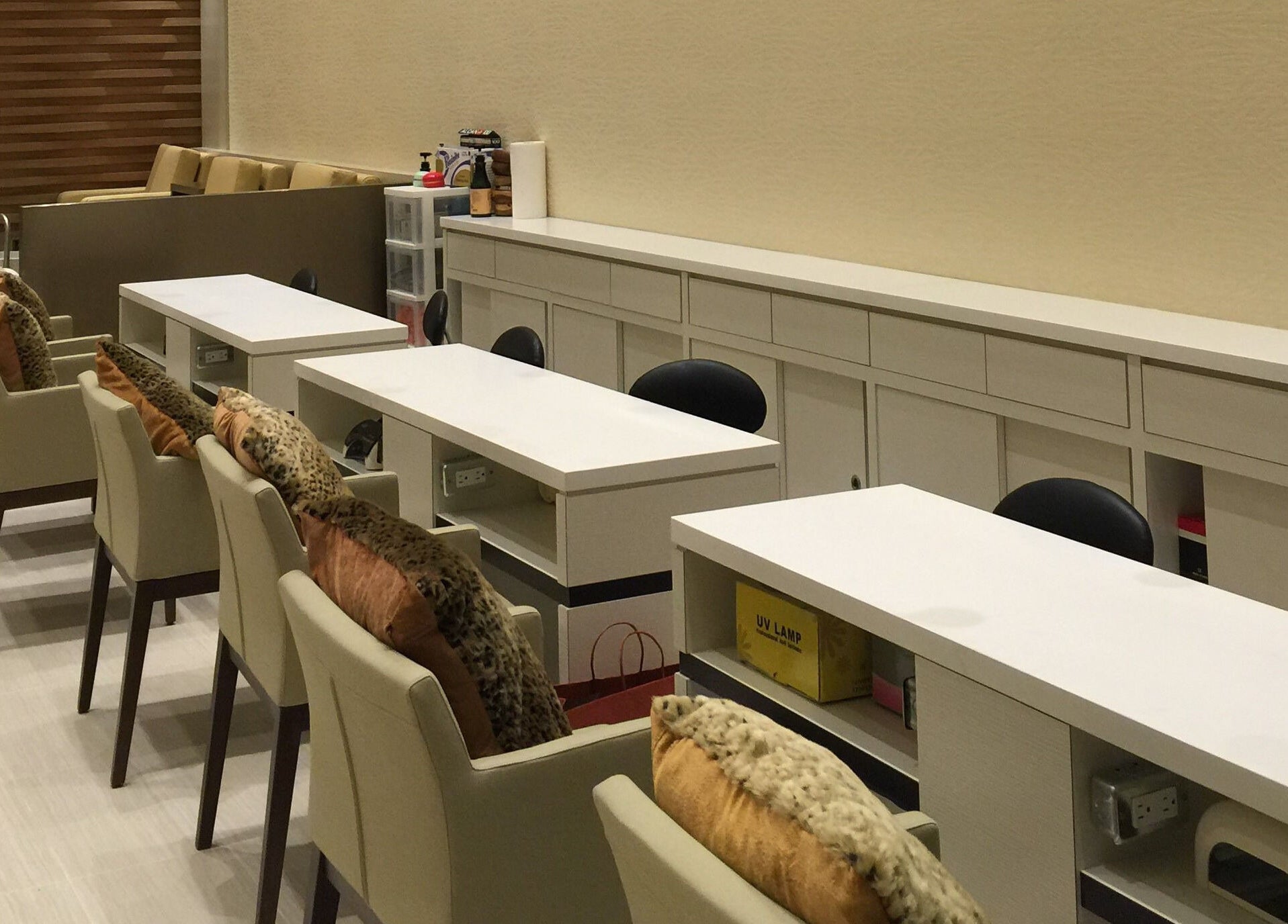 Modern, chic nail stations at Essence Nails & Spa, Vaughan, Ontario, CA, showcasing luxury and comfort.