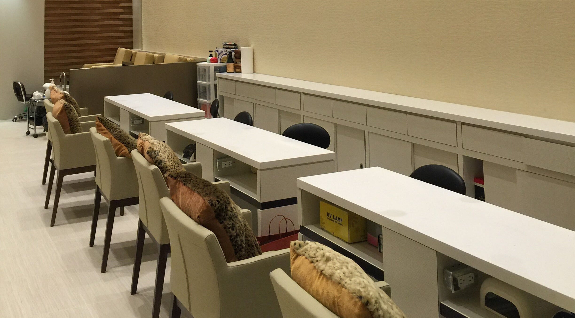 Modern, chic nail stations at Essence Nails & Spa, Vaughan, Ontario, CA, showcasing luxury and comfort.