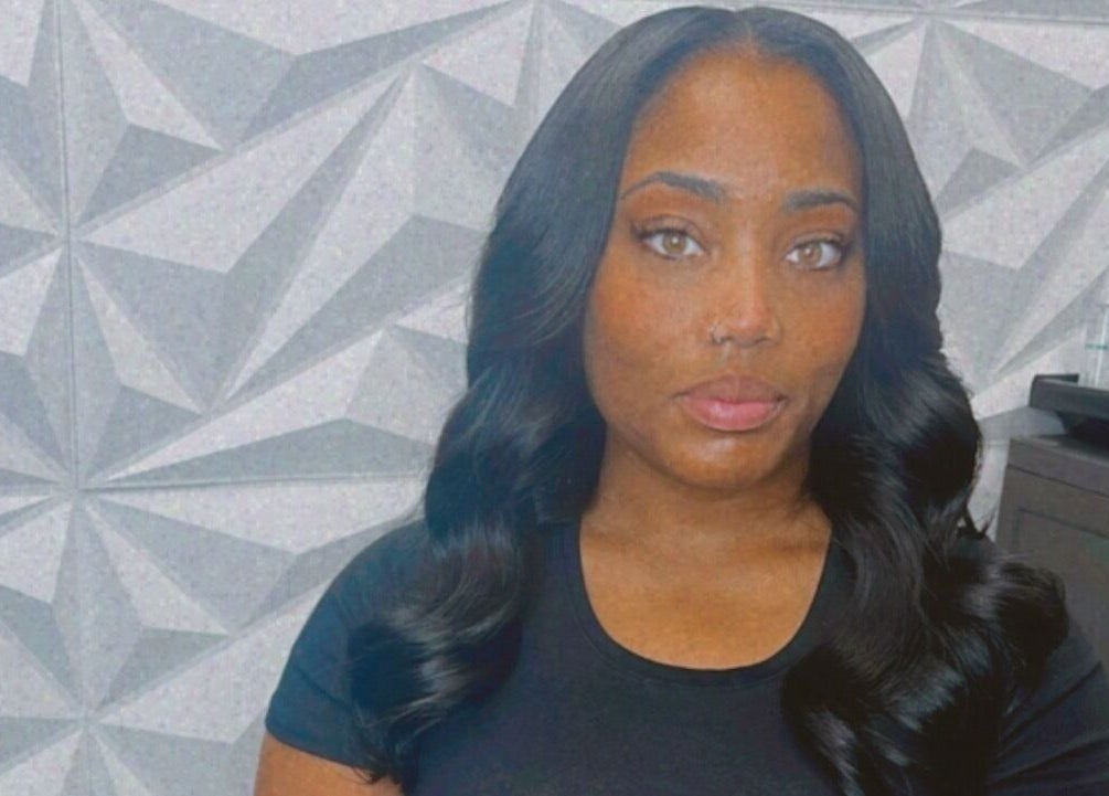 A stylish visitor at The T Pearl Collection in Wilmington, Delaware, US showcases elegant hair styling.