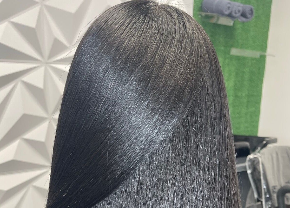 Smooth, shiny hair treatment at The T Pearl Collection in Wilmington, Delaware, US.