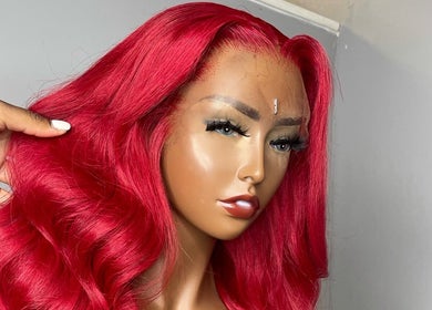 Vibrant red wig showcased at The T Pearl Collection, Wilmington, Delaware, US.
