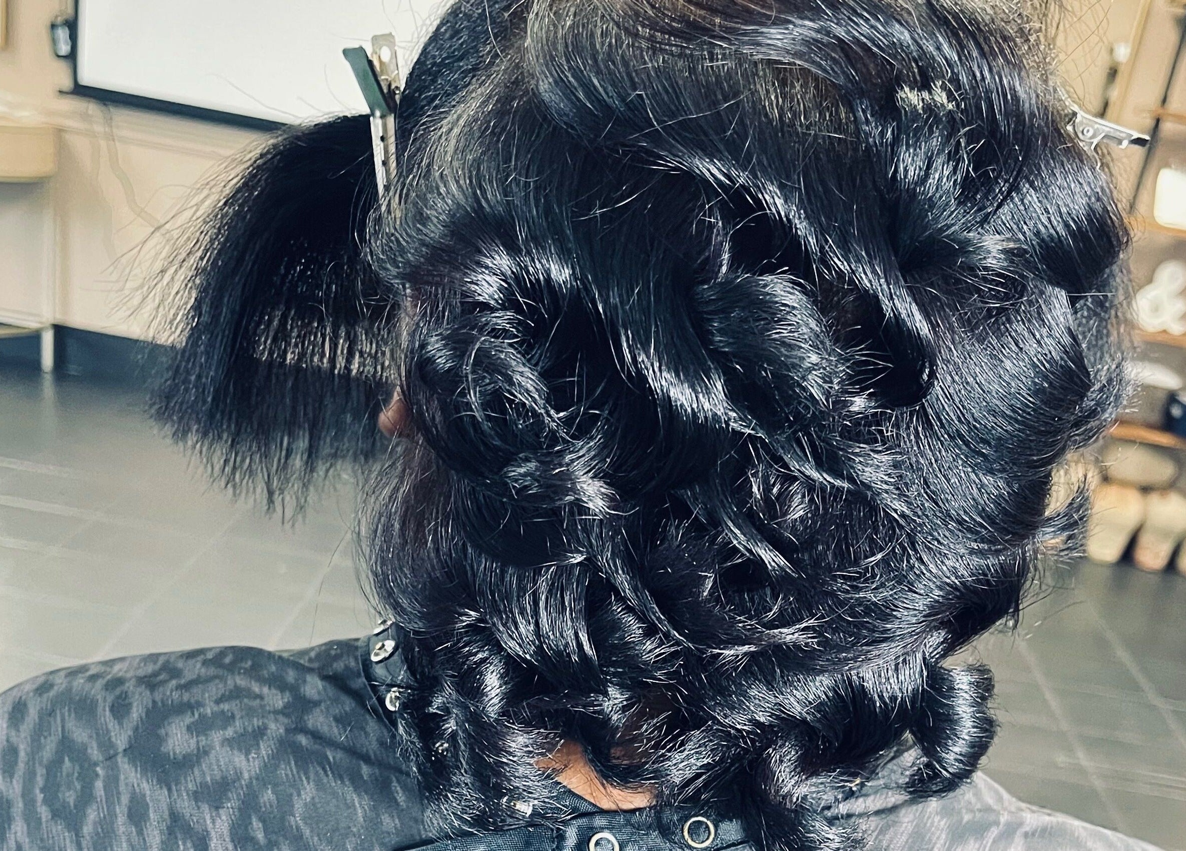 Glamorous curled hairstyle at The T Pearl Collection, Wilmington, Delaware, US.