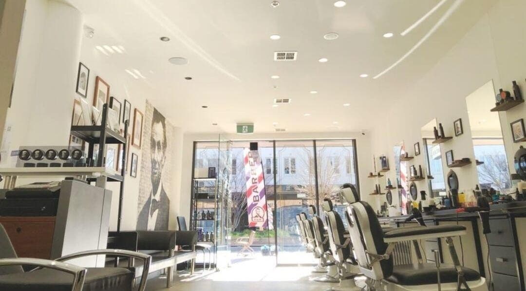 Stylish interior of H and M Barber Kingston, Kingston, Australian Capital Territory, AU, highlighting modern design.