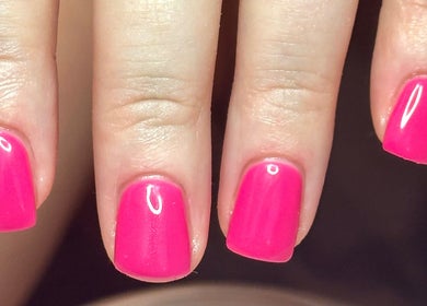 Vibrant pink nails designed by LilyBeautyandNails in Burton-on-trent, England, GB, showcasing expert nail artistry.
