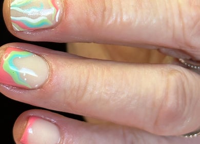 Colorful abstract nail art at LilyBeautyandNails, Burton-on-trent, England, GB showcasing vibrant design.