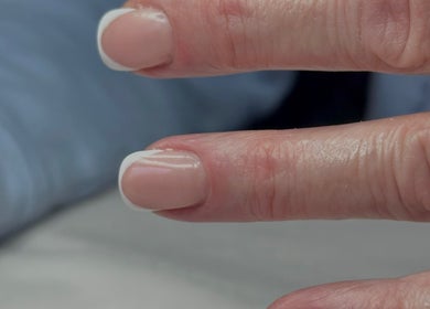 Elegant French manicure at LilyBeautyandNails, Burton-on-trent, England. Discover timeless nail art here.