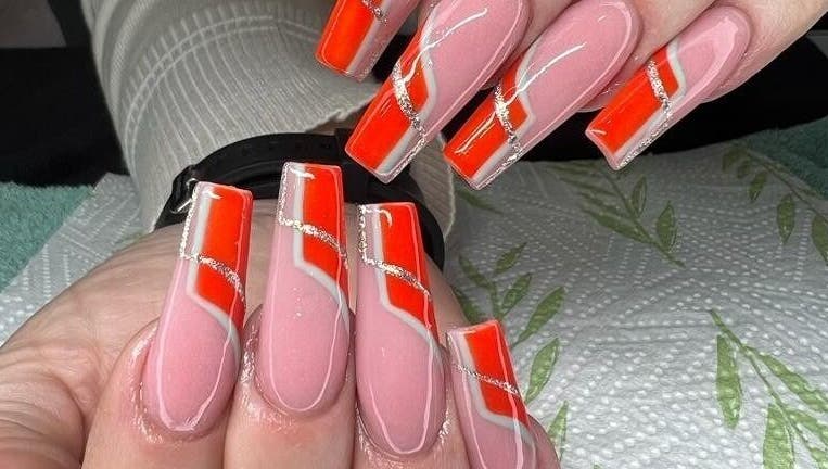 Bold red and pink manicured nails at Nails by Sam Potch, Potchefstroom, South Africa, ZA.