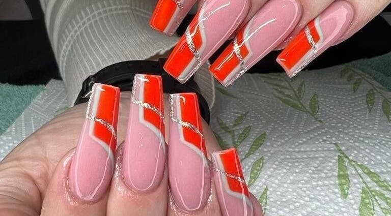 Bold red and pink manicured nails at Nails by Sam Potch, Potchefstroom, South Africa, ZA.
