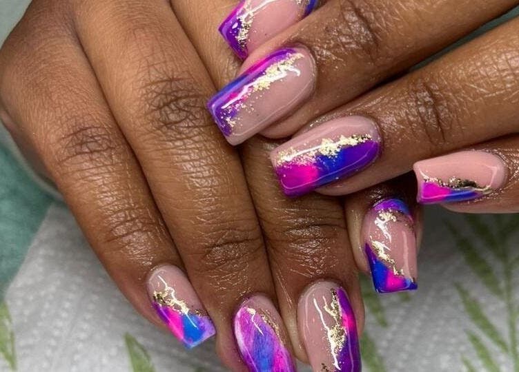 Vibrant nail art with purple and gold accents at Nails by Sam Potch, Potchefstroom, South Africa, ZA.