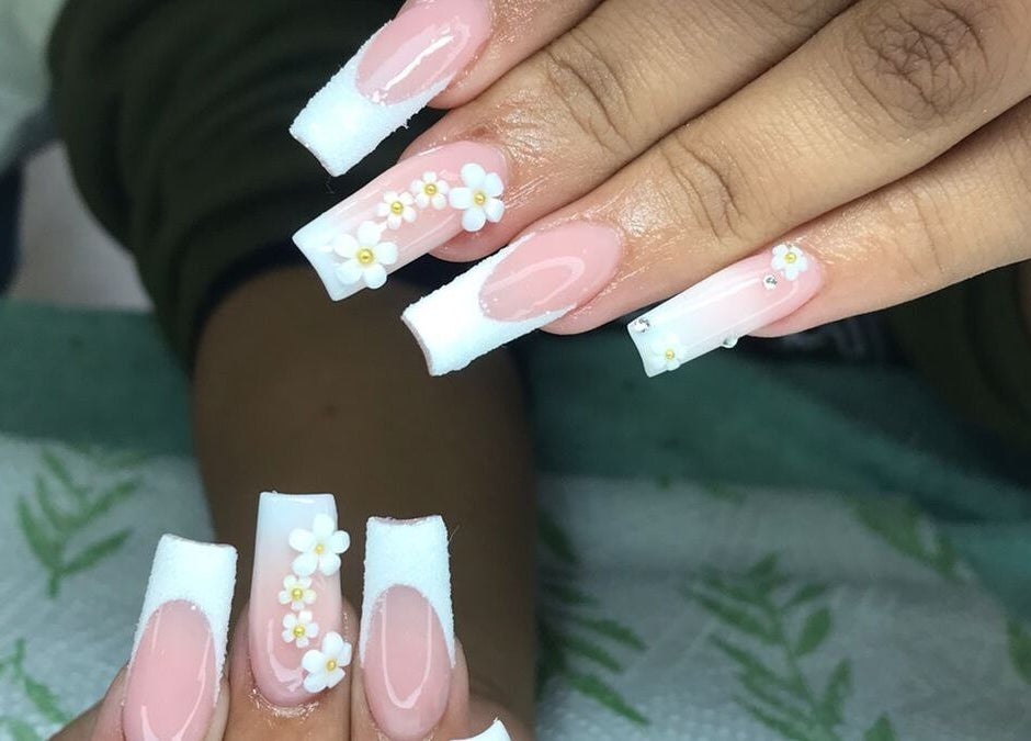 Elegant floral nail art at Nails by Sam Potch, Potchefstroom, South Africa, ZA. Perfectly crafted white and pink designs.