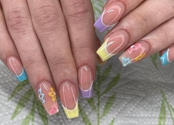 Bright, artistic nails at Nails by Sam Potch, Potchefstroom, South Africa, ZA showcasing colorful floral designs.