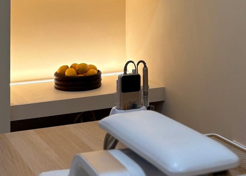Serene treatment room at By Jasmine Rose P, Longwell Green, England, GB with cozy lighting and modern equipment.