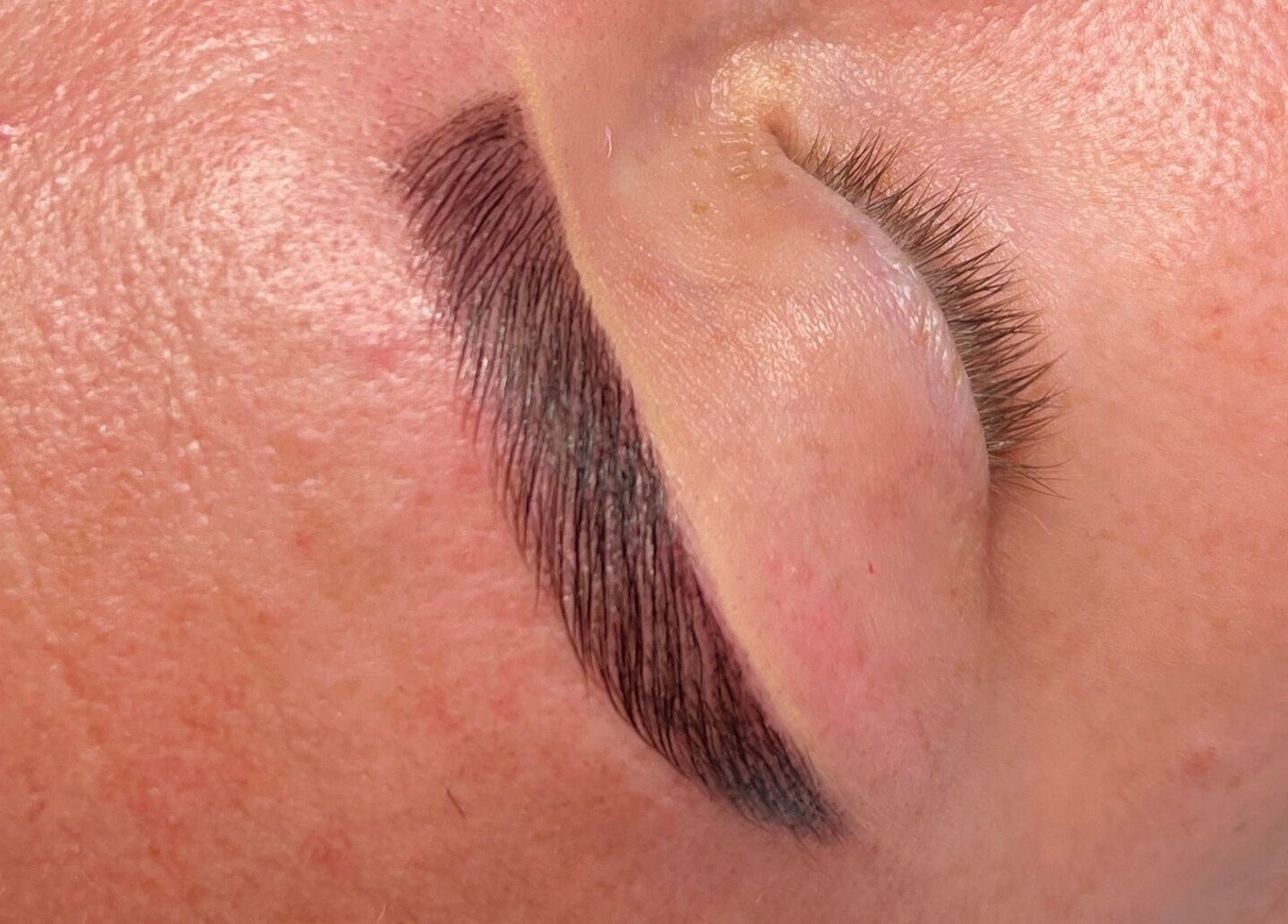 Close-up of expertly shaped eyebrow by SlayedbySophie in Folkestone, England, GB, highlighting precision beauty.