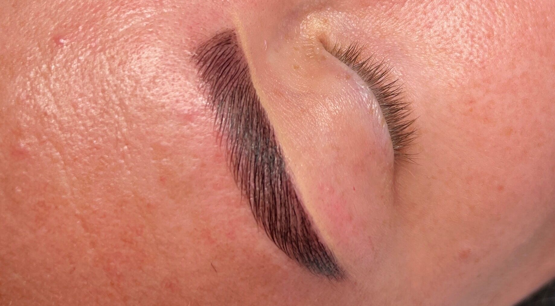 Close-up of expertly shaped eyebrow by SlayedbySophie in Folkestone, England, GB, highlighting precision beauty.