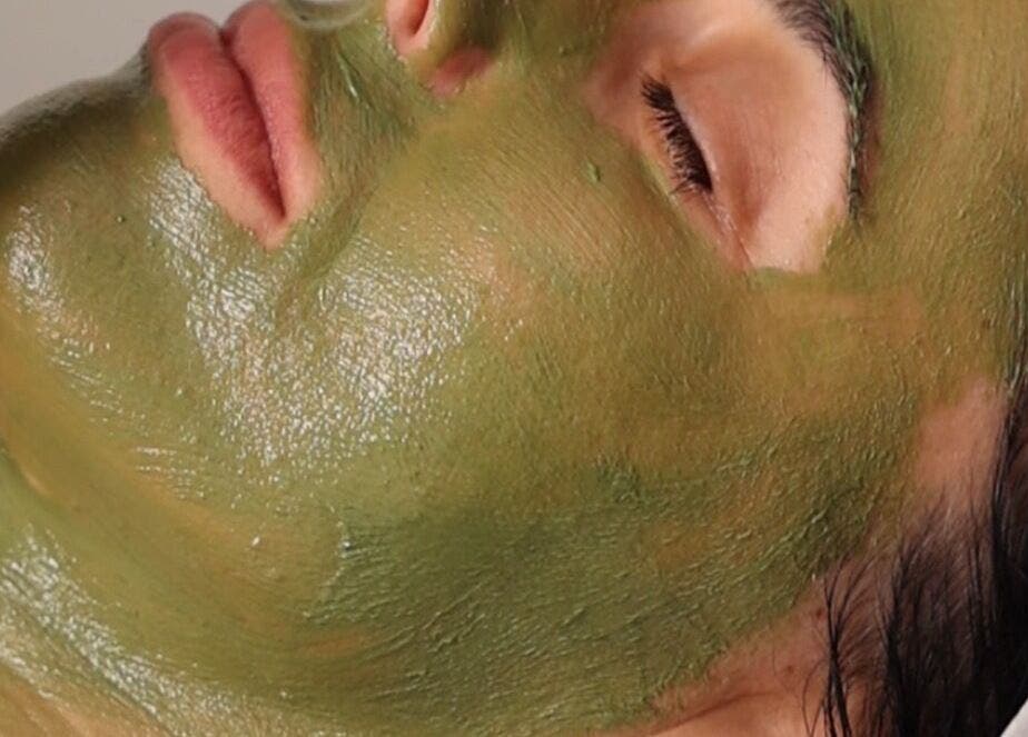 Relaxing facial with green mask at Fresh Faced Aesthetics, San Diego, California, US for glowing skin.