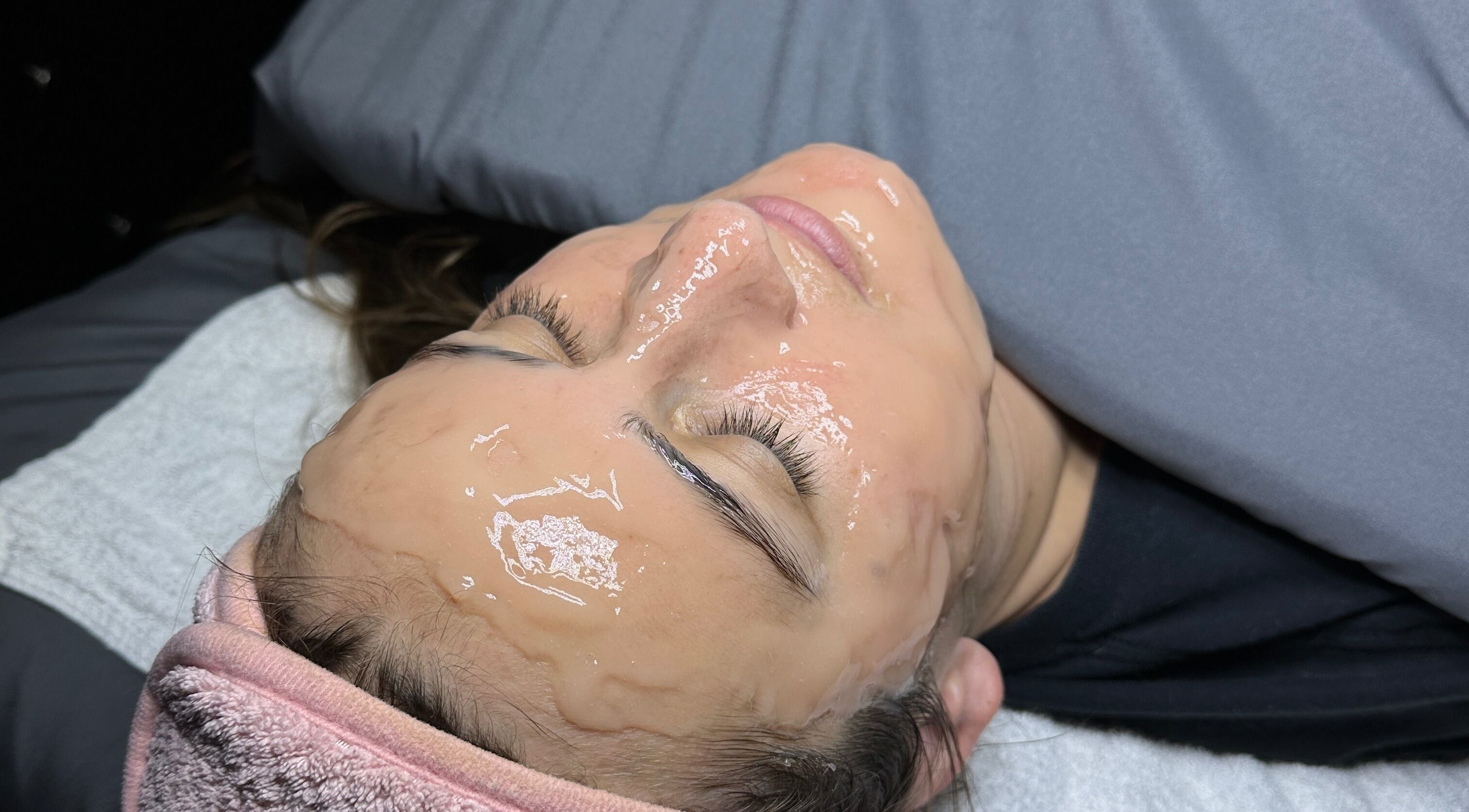 Facial treatment at Fresh Faced Aesthetics in San Diego, California, US, showcasing relaxation and skincare.