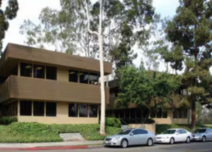 Front view of Fresh Faced Aesthetics, nestled in lush greenery, San Diego, California, US.