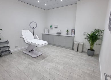 Modern treatment room at Aesthetics by Hannah, Gainsborough, England, GB featuring a sleek white chair and decor.