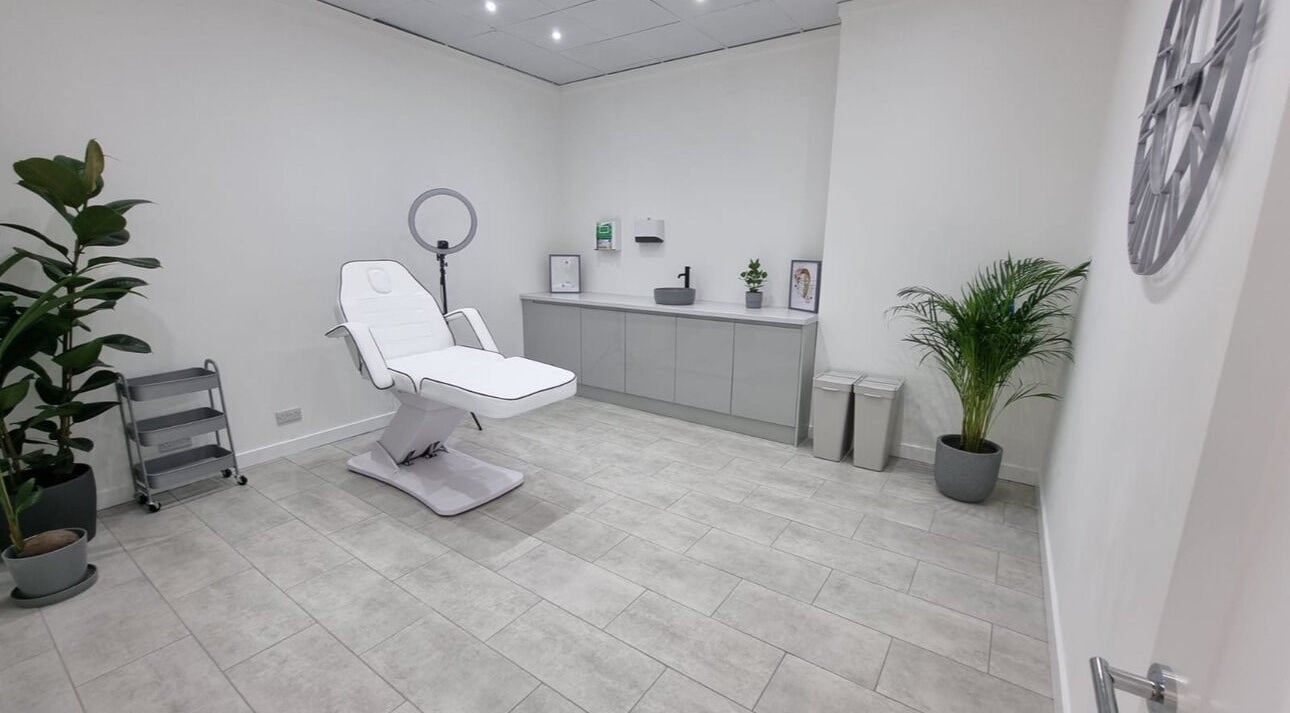 Modern treatment room at Aesthetics by Hannah, Gainsborough, England, GB featuring a sleek white chair and decor.