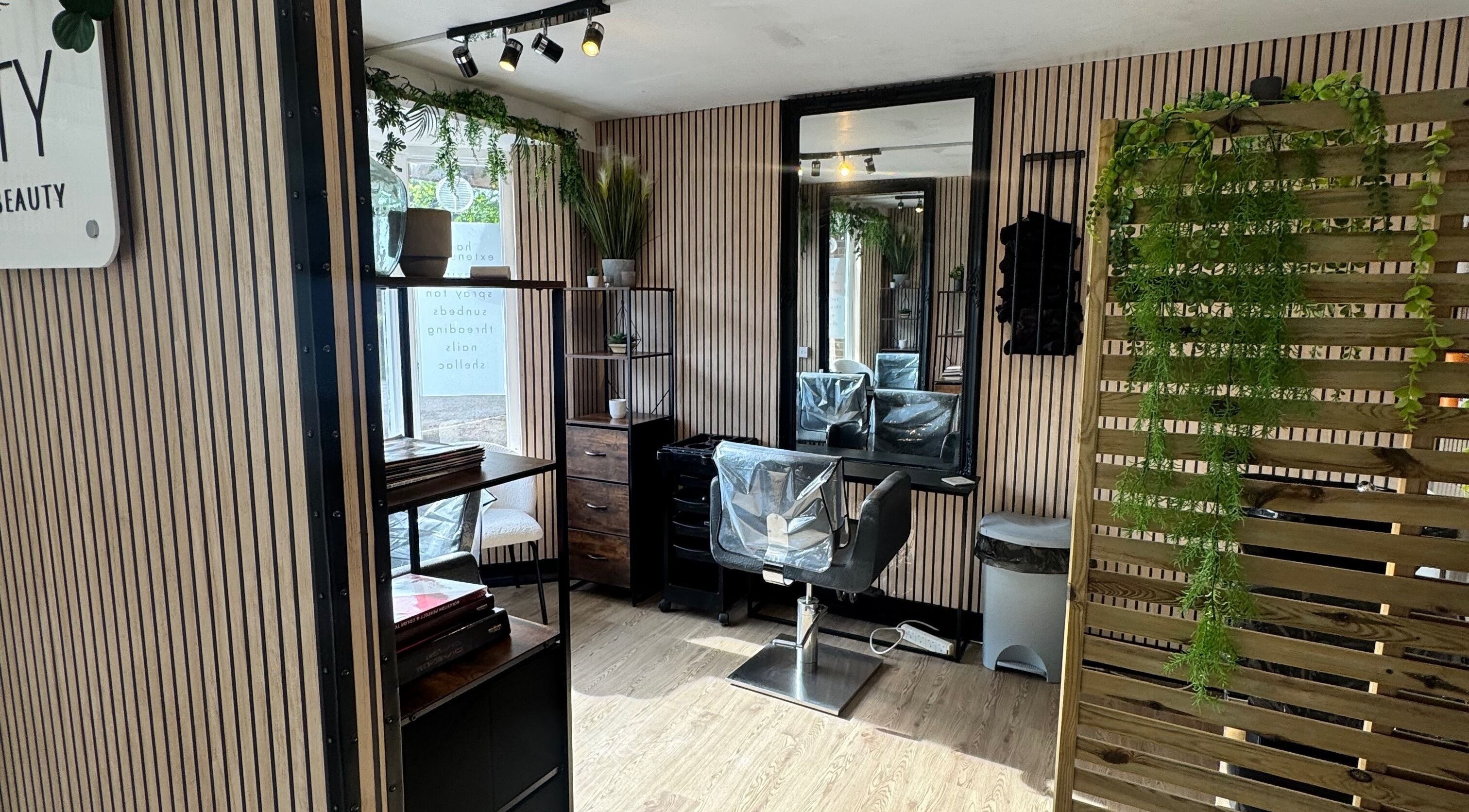 Modern salon interior at Vanity Beauty Naphill, High Wycombe, England, GB with stylish decor and salon chair.