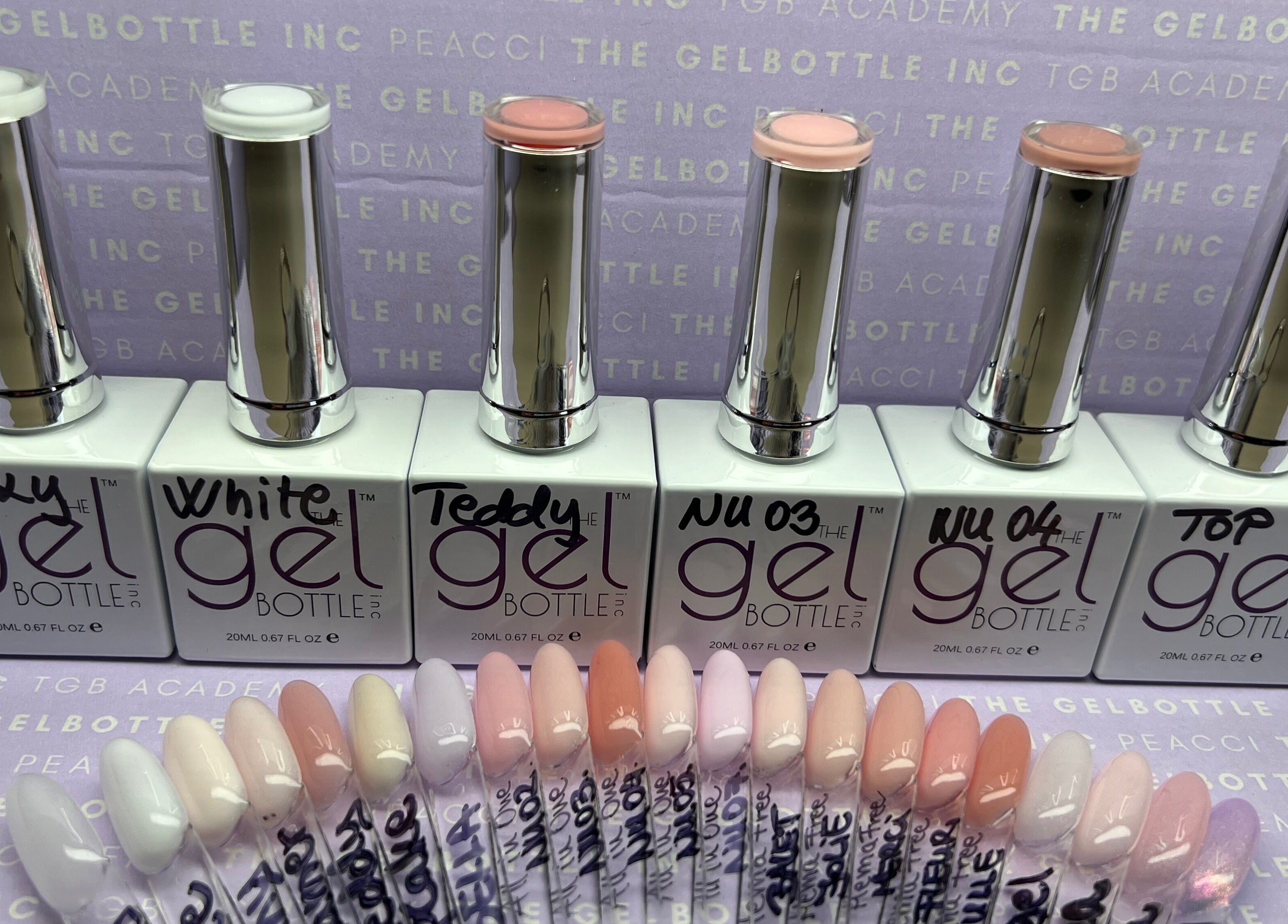 Display of gel nail polishes at Bon-Di Nails, Bristol, Anglia, GB showcasing vibrant colors.