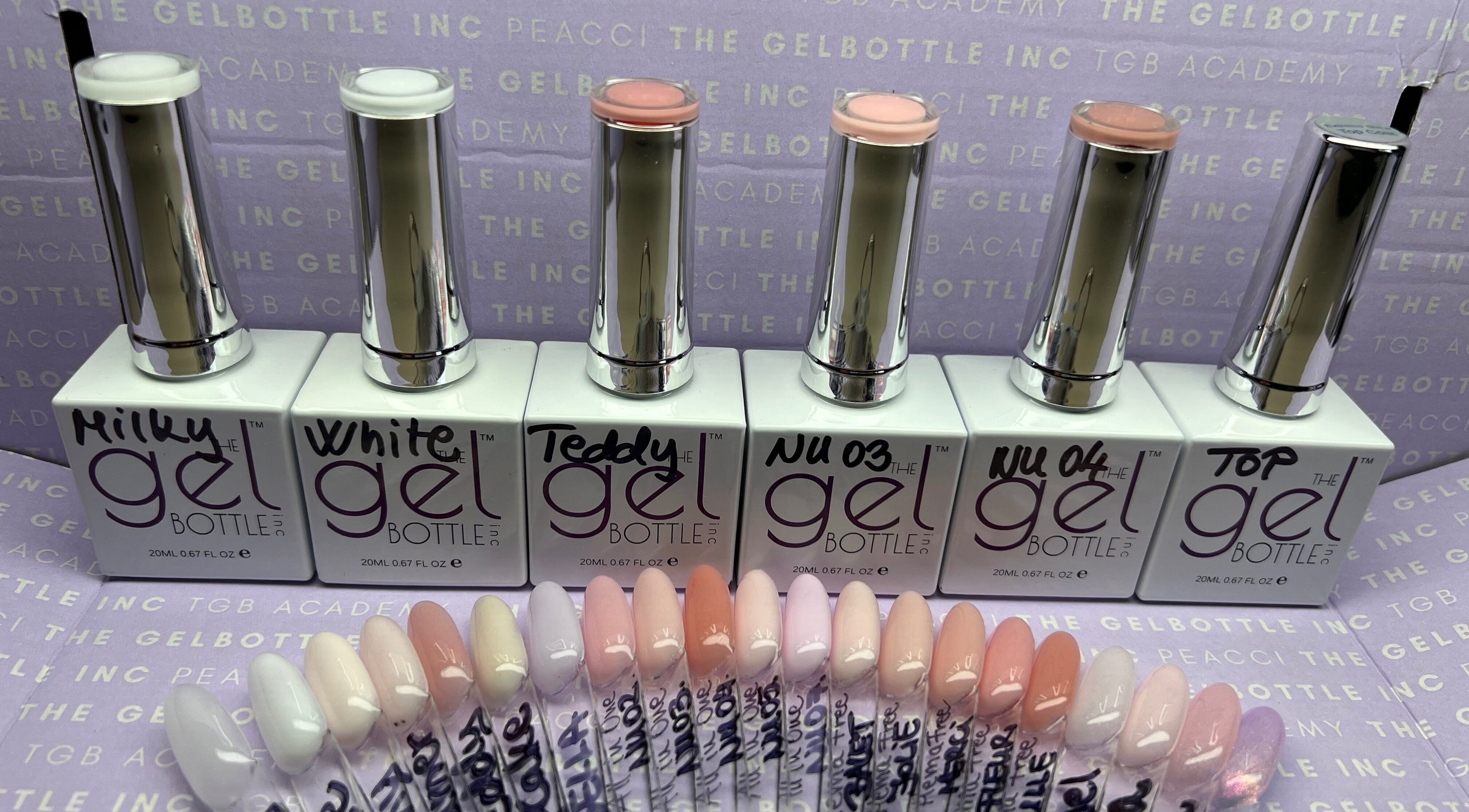 Display of gel nail polishes at Bon-Di Nails, Bristol, Anglia, GB showcasing vibrant colors.