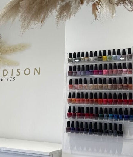 Nail polish display at Madison Aesthetics, Berkhamsted, England, GB with stylish decor.