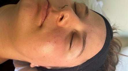 Peaceful face at Beauty and the Belle in Ash Vale, England, GB, showcasing smooth, glowing skin after a facial.