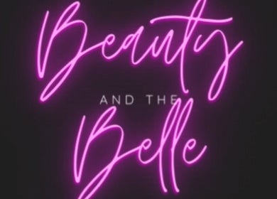 Neon sign for Beauty and the Belle in Ash Vale, England, GB. Vibrant and inviting salon ambiance.