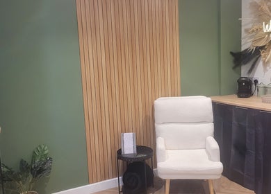 Cozy waiting area in Glam On The Lash, Trimley Saint Mary, England, GB with plush chair and welcoming decor.