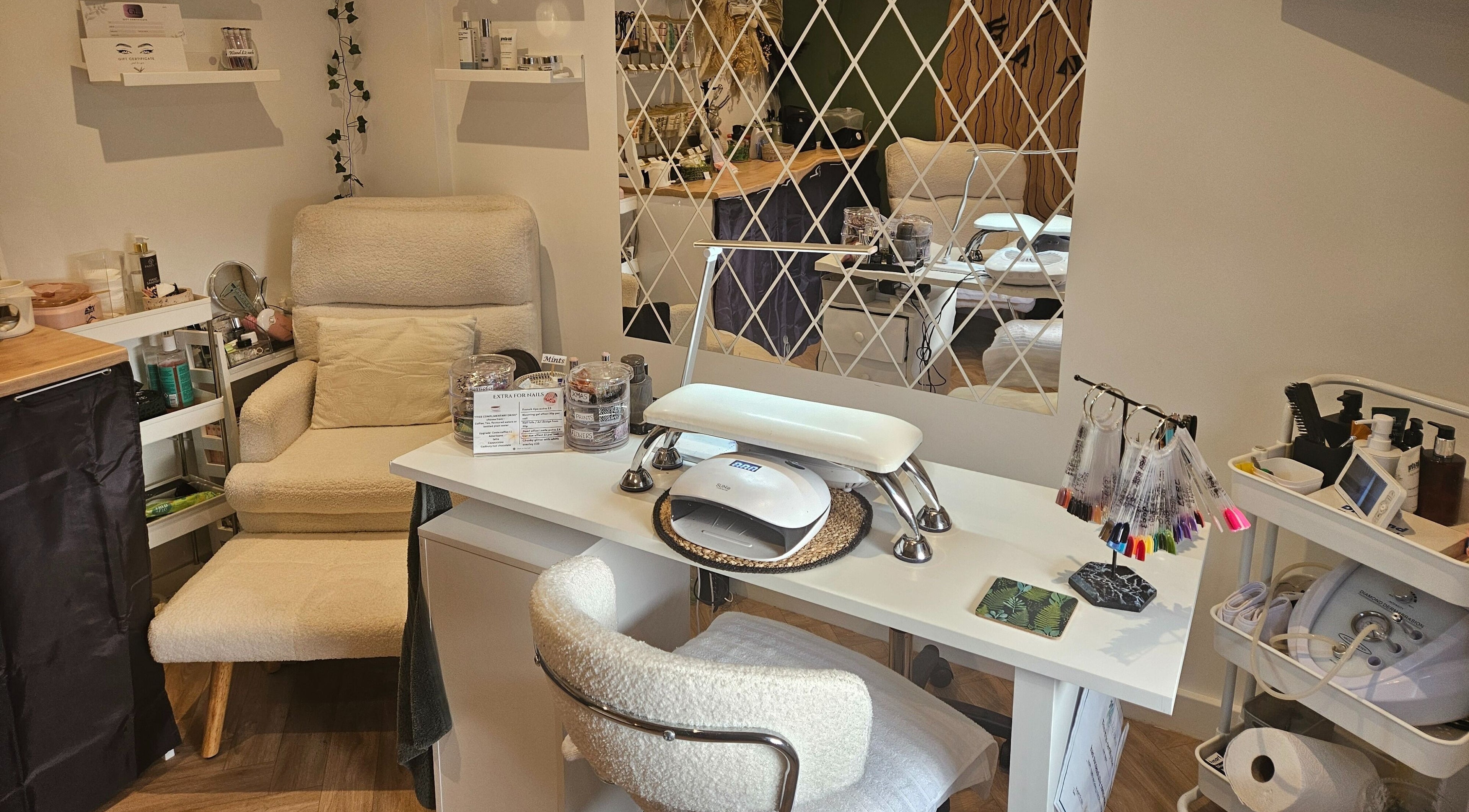 Cozy nail station at Glam On The Lash, Trimley Saint Mary, England, GB with manicure tools and decor.