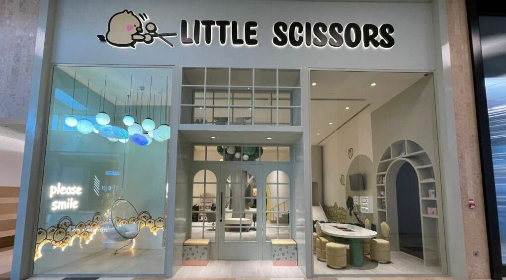 Front view of Little Scissors Kids Salon in Abu Dhabi, AE, showcasing its inviting and modern design.