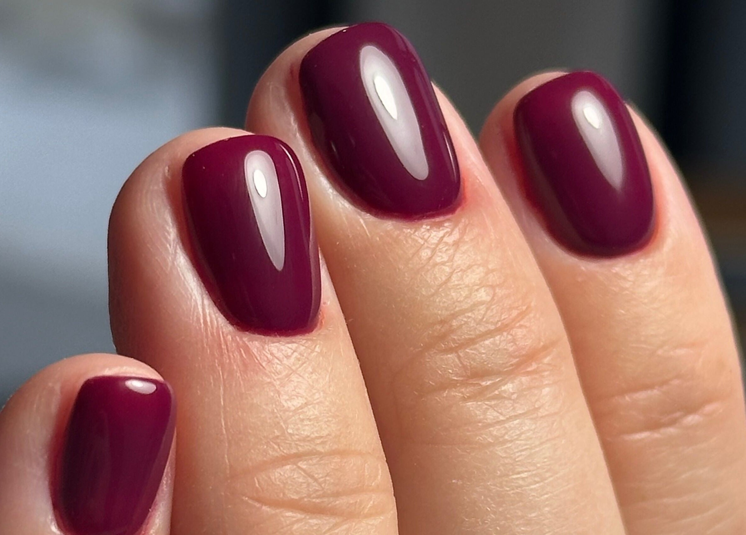Glossy burgundy nails at La Petite Onglerie & Co., Mascouche, Québec, CA.