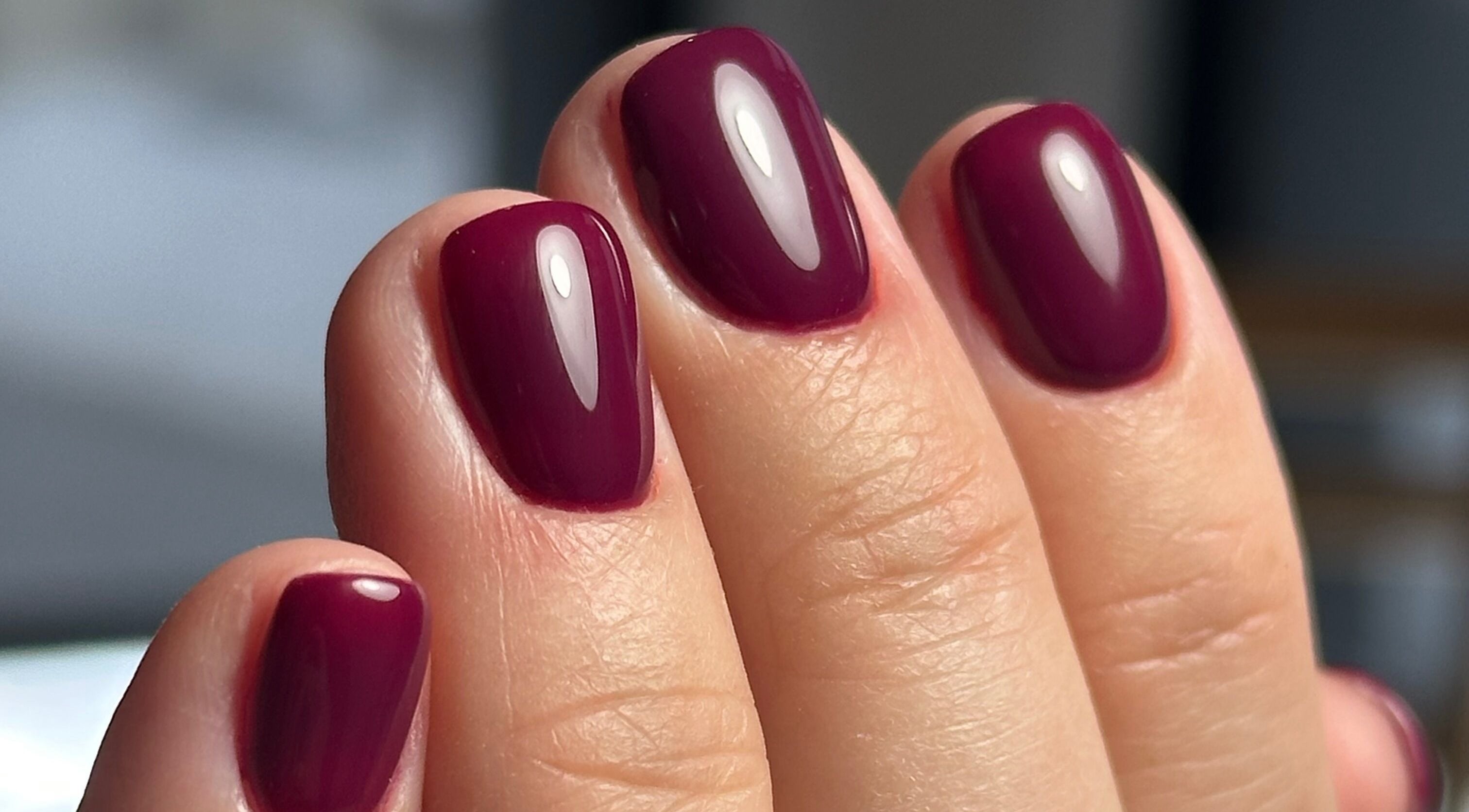 Glossy burgundy nails at La Petite Onglerie & Co., Mascouche, Québec, CA.
