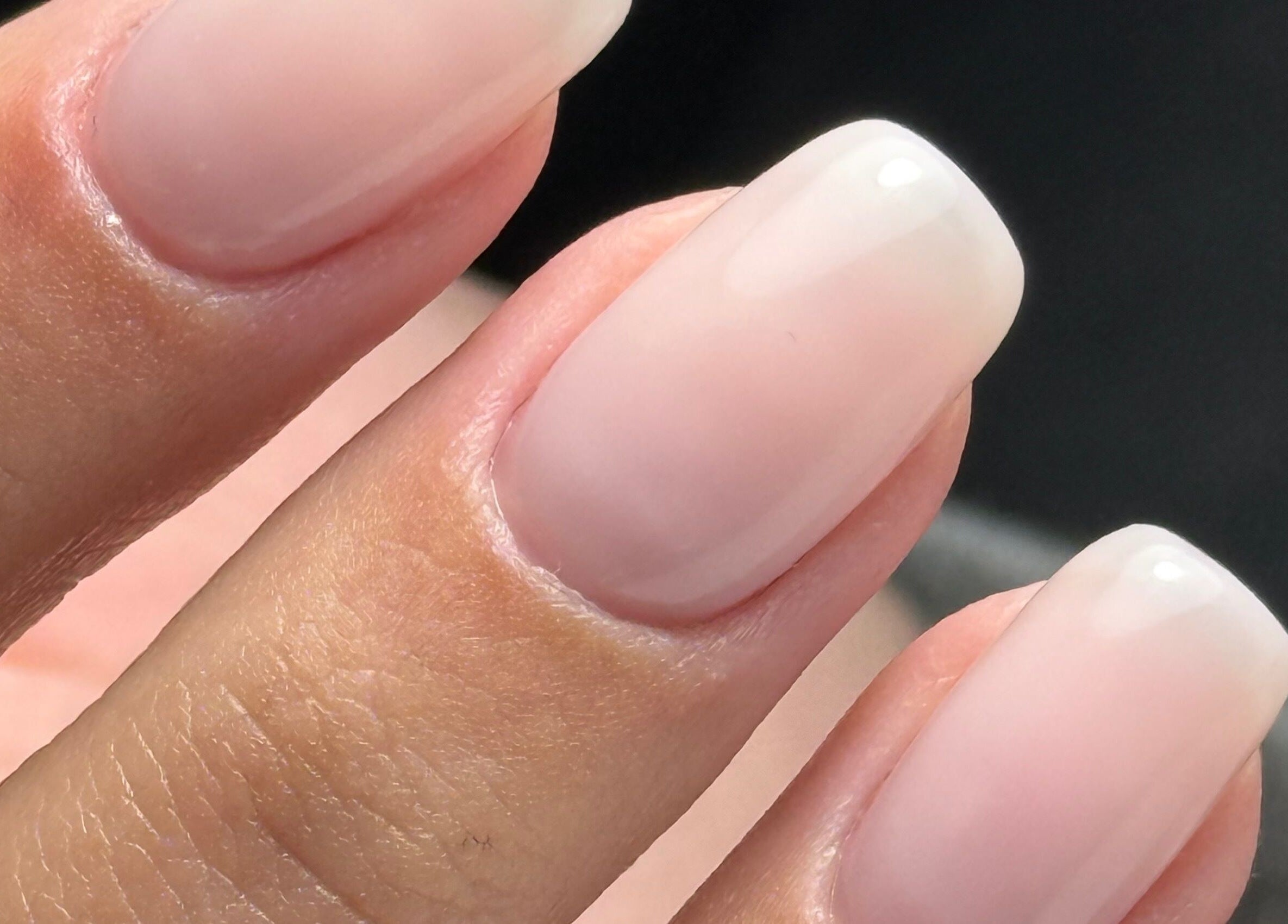 Perfectly manicured nails at La Petite Onglerie & Co., Mascouche, Québec, CA, showcasing professional nail care.