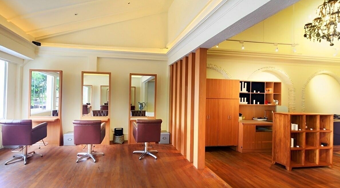 Stylish interior of Art-Noise Japanese Beauty Hair Salon SG with elegant wood accents, Singapore, Singapore, SG.