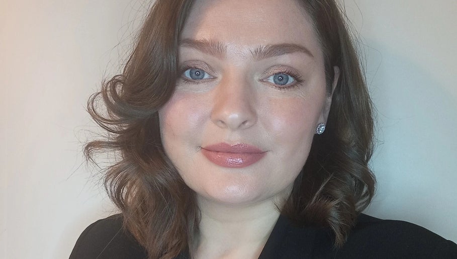 Person with styled hair and makeup at Teresa Boland Trichology, Ballina, Connacht, IE.
