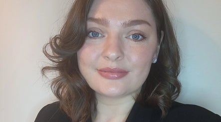 Person with styled hair and makeup at Teresa Boland Trichology, Ballina, Connacht, IE.