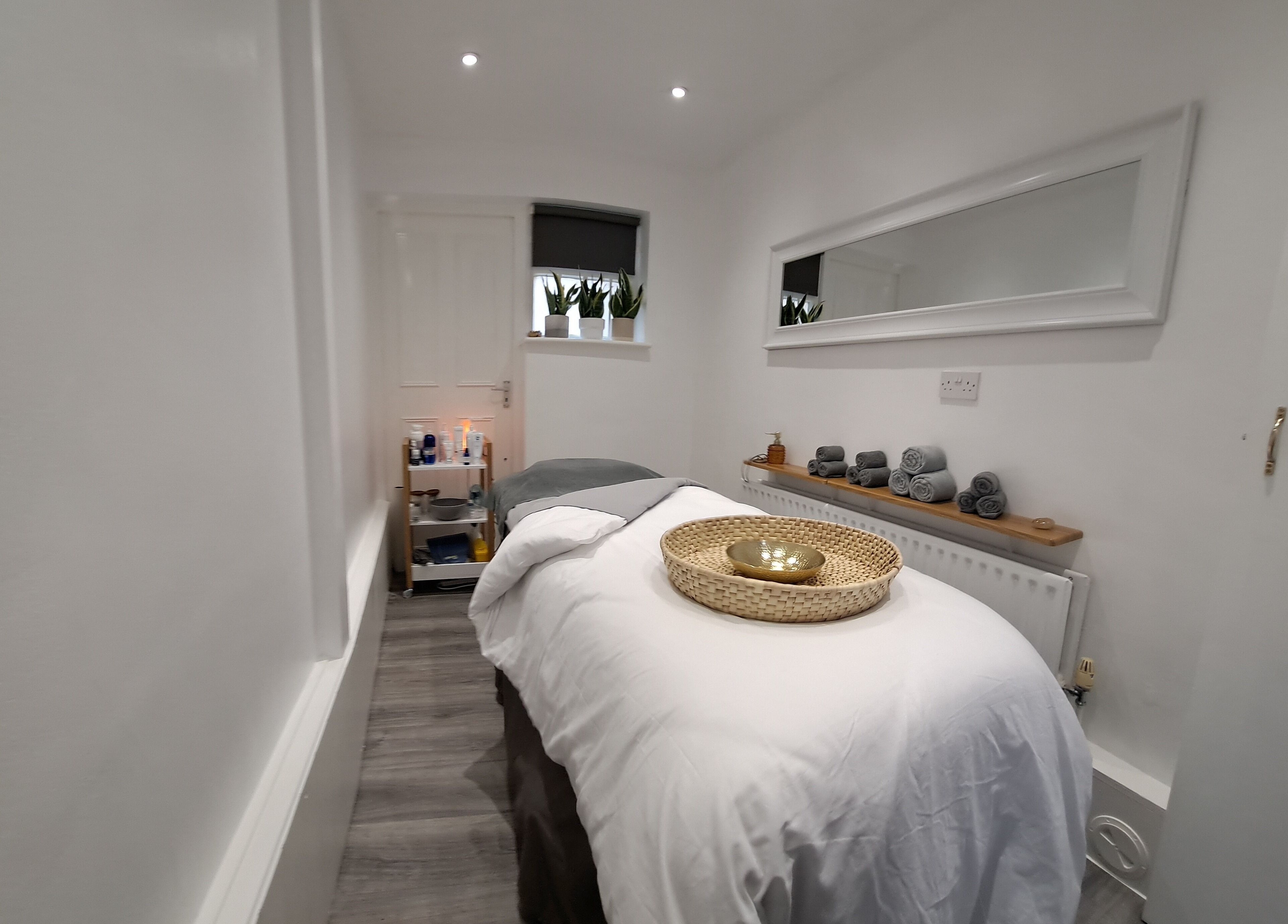 Relaxing treatment room at My Face Spa, London, England, GB for a serene wellness experience.