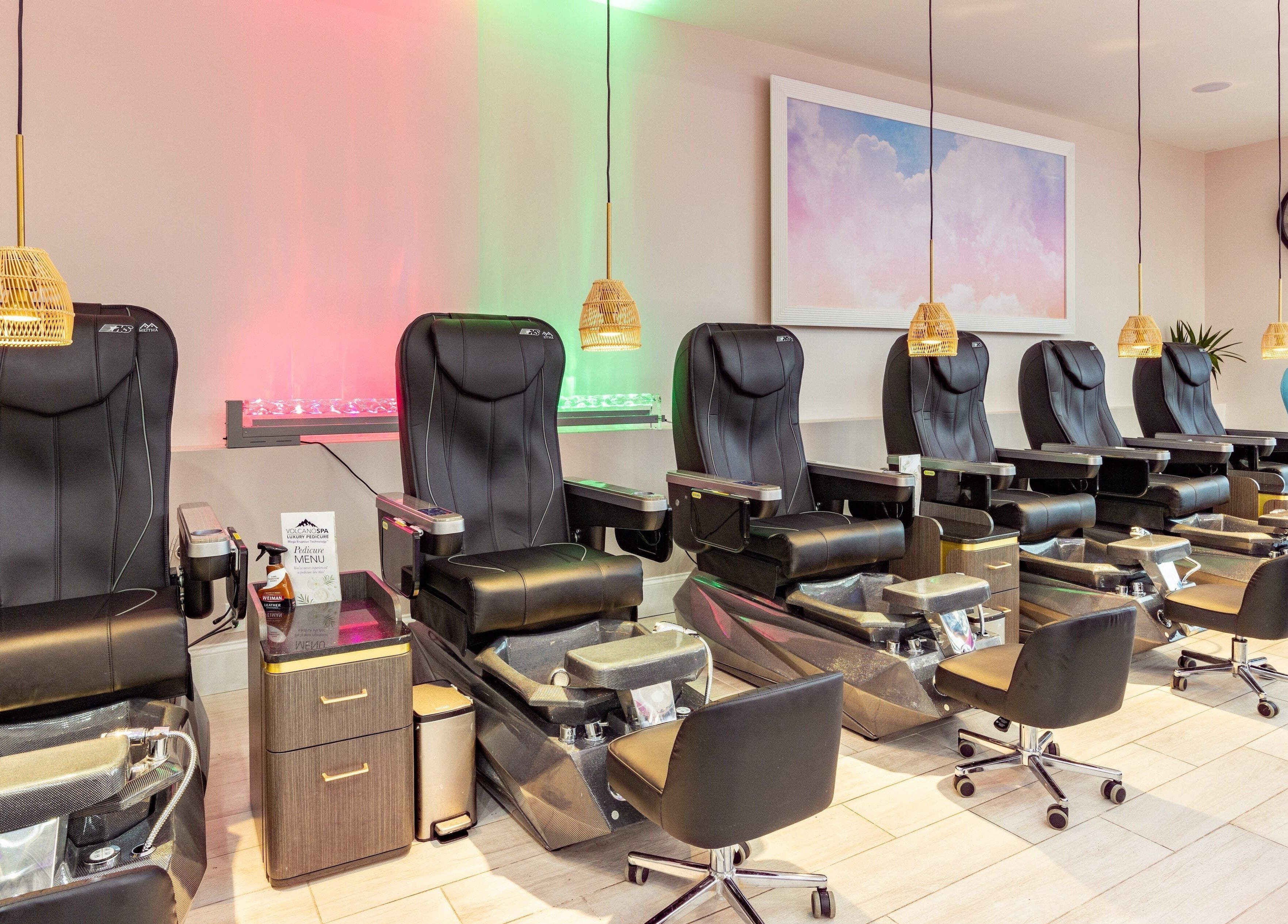 Sleek pedicure chairs at The Nail Palace in Lowell, Massachusetts, US, offering luxury and comfort.