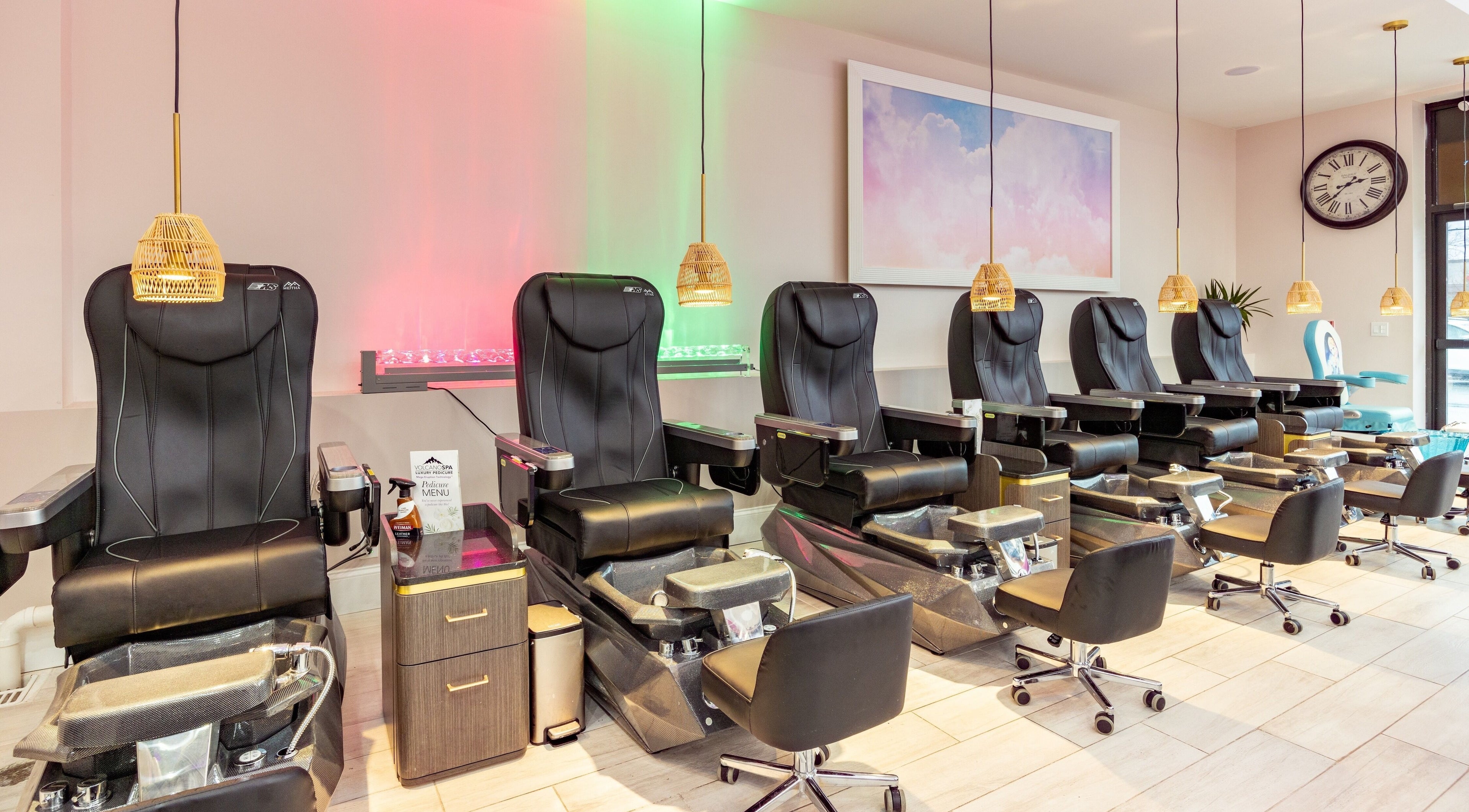Sleek pedicure chairs at The Nail Palace in Lowell, Massachusetts, US, offering luxury and comfort.
