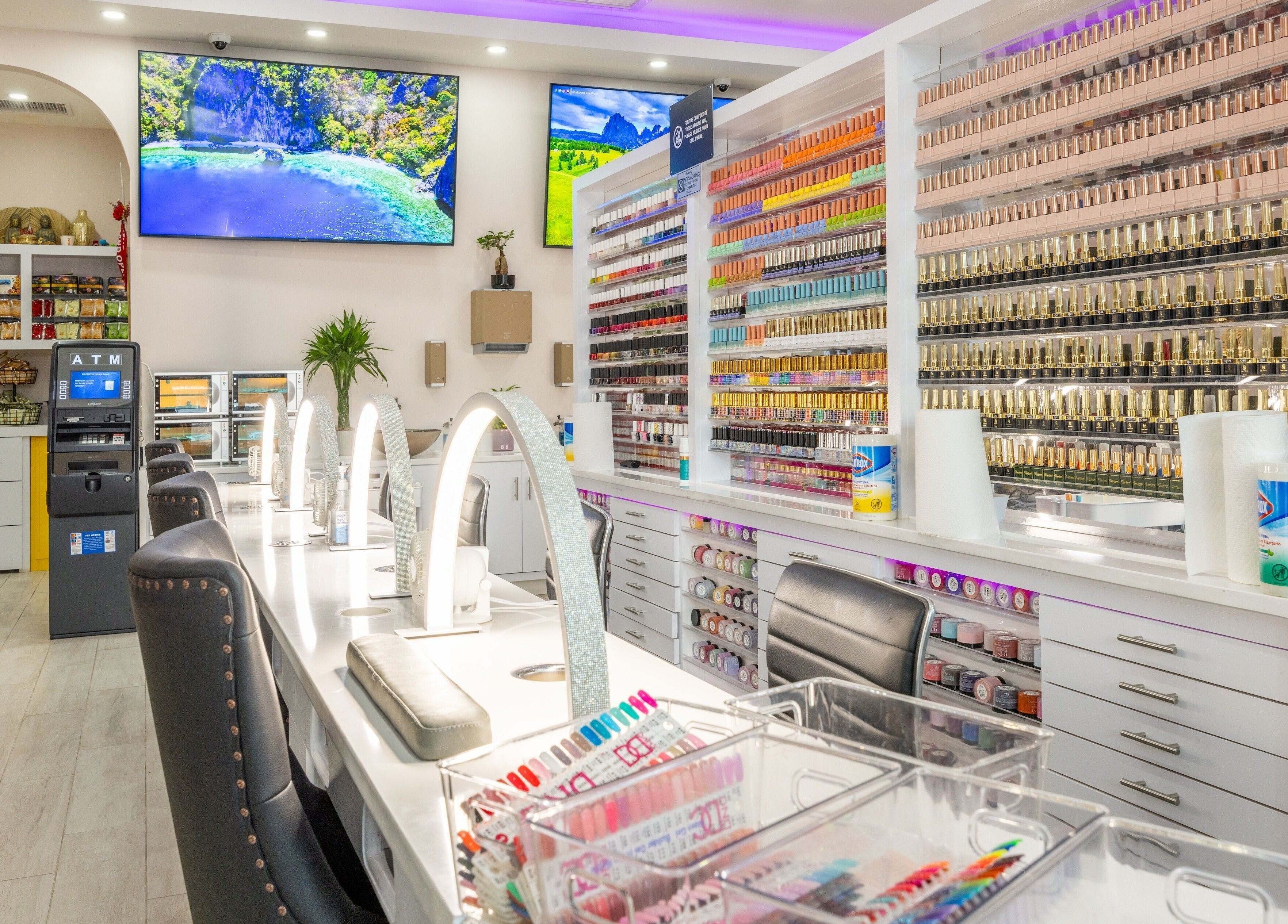 Chic interior of The Nail Palace in Lowell, Massachusetts, US, featuring vibrant nail polish display.