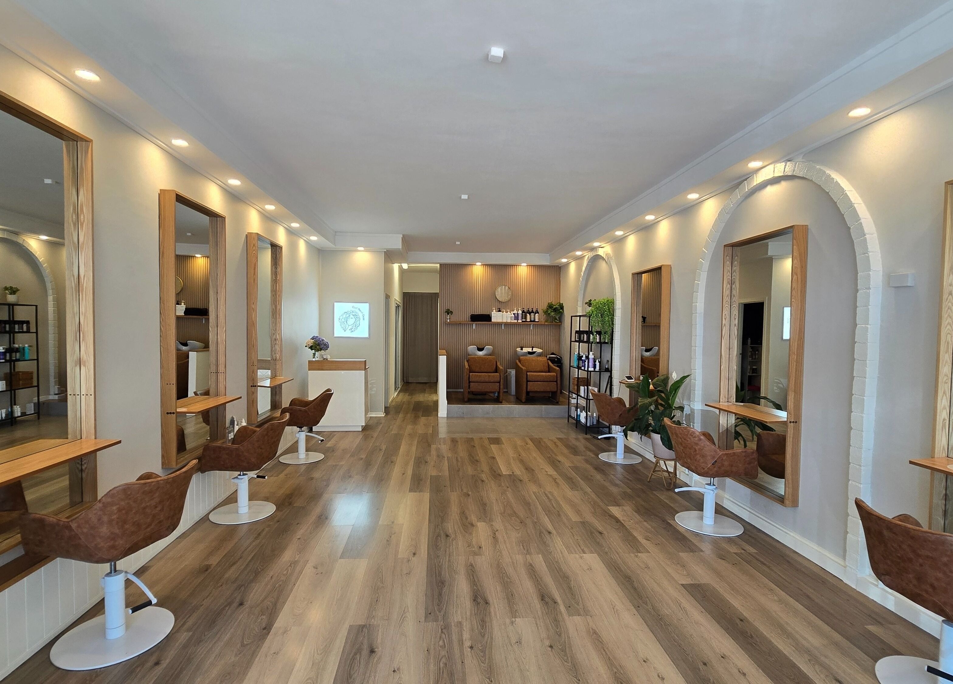 Stylish interior of Lokk Mechanic salon in Melbourne, Victoria, AU with modern chairs and mirrors.