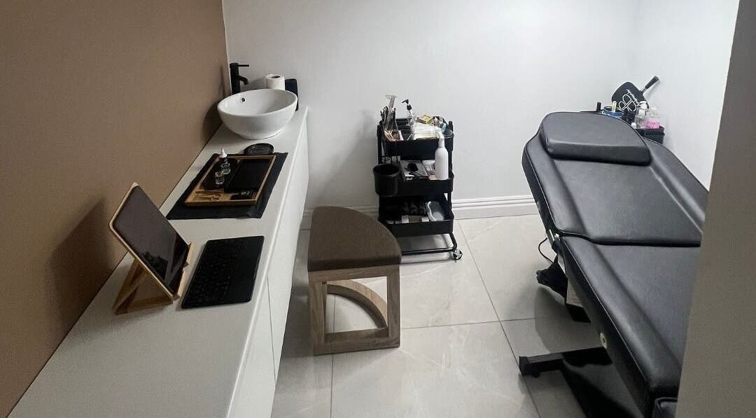 Modern treatment room at AURA THE CLINIC, Newcastle upon Tyne, England, GB with sleek décor and equipment.